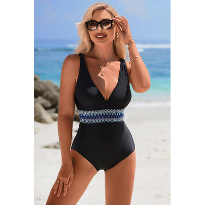 Charmo Women's V-Neck One Piece Swimsuit Embroidered Waist Band & Back Cutout Bathing Suits