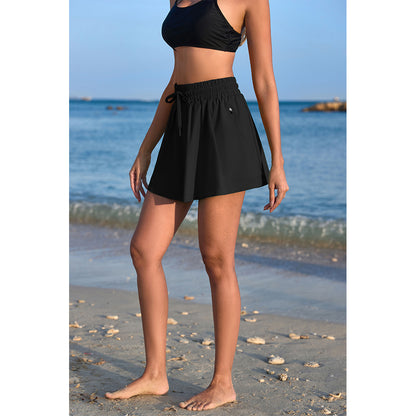 Charmo Women's High Waisted Smocked Drawstring Swim Skirt with Side Zipper Pockets and Built-in Briefs