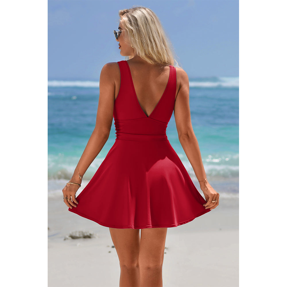 Charmo Women's Sleeveless V-Neck Backless Skirted One-Piece Swimsuit With Built In Bottom & Side Slit Swim Dress