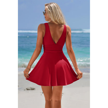 Charmo Women's Sleeveless V-Neck Backless Skirted One-Piece Swimsuit With Built In Bottom & Side Slit Swim Dress