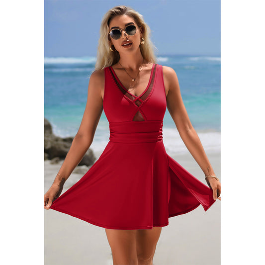 Charmo Women's Sleeveless V-Neck Backless Skirted One-Piece Swimsuit With Built In Bottom & Side Slit Swim Dress
