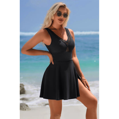 Charmo Women's Sleeveless V-Neck Backless Skirted One-Piece Swimsuit With Built In Bottom & Side Slit Swim Dress