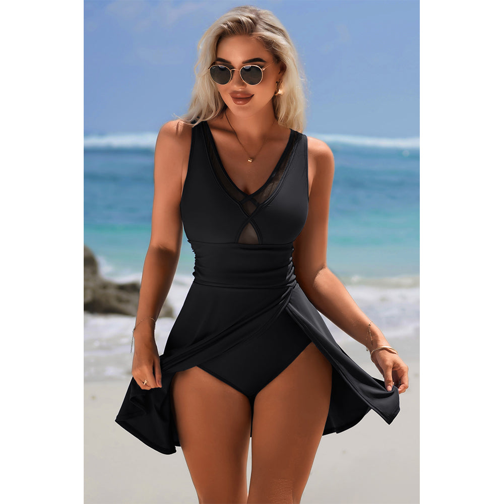 Charmo Women's Sleeveless V-Neck Backless Skirted One-Piece Swimsuit With Built In Bottom & Side Slit Swim Dress
