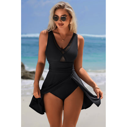 Charmo Women's Sleeveless V-Neck Backless Skirted One-Piece Swimsuit With Built In Bottom & Side Slit Swim Dress