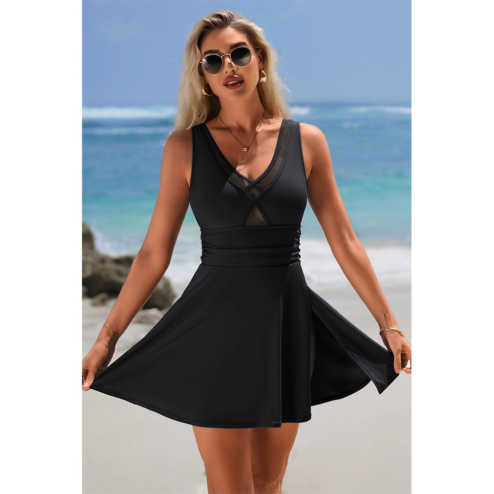 Charmo Women's Sleeveless V-Neck Backless Skirted One-Piece Swimsuit With Built In Bottom & Side Slit Swim Dress